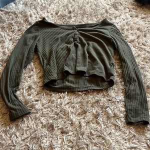 Olive green ribbed long sleeve shirt.